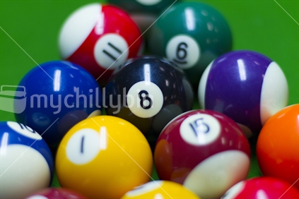 pool rack with eightball in focus and others out of focus