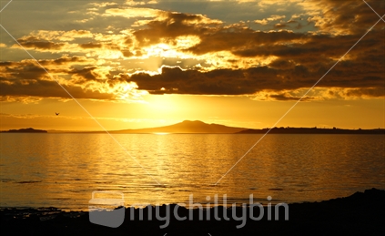Rangitoto Island, at sunset from Omana Beach, Auckland.