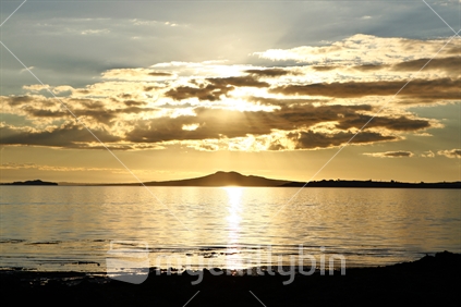 Rangitoto Island at sunset from Omana Beach, Auckland.