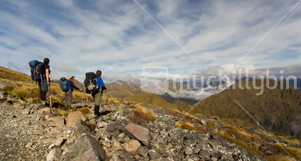 Trampers stop to admire the spectacular views along the open ridge on the Kepler track