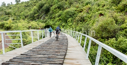 Cyclists on the old Hapuawhenua heritage viaduct