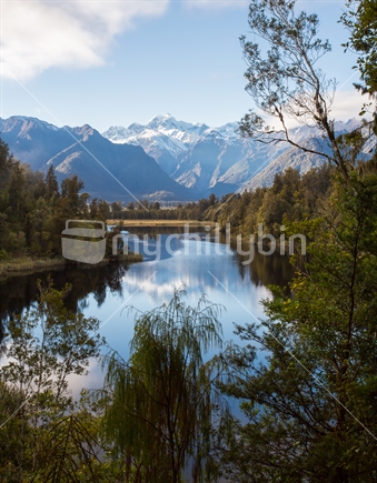 Mt Cook reflected in the calm waters of Lake Matheson