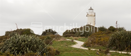 The historic lighthouse on Cape Foulwinds coastal walk