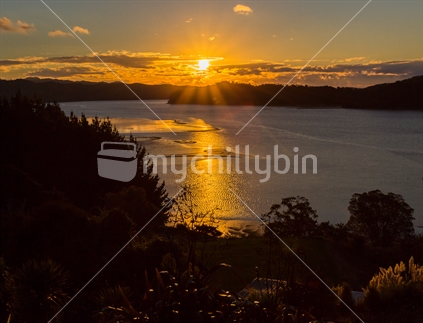Sunset over one of the inlets of the Kawhia harbour