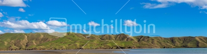 The rolling green hills surround the Kawhia harbour on the west coast of the North Island