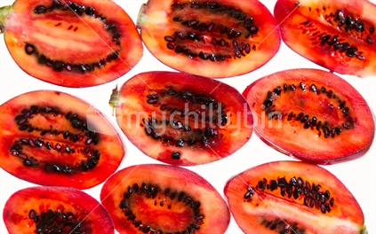 Tamarillos sliced and aligned