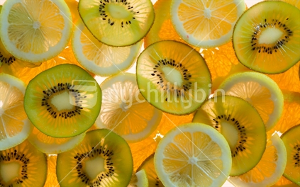 Layered slices of kiwifruit, lemons and oranges