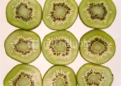 Slices of kiwifruit in lines
