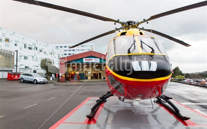 Westpac rescue helicopter on landing pad at Waikato Hospital, outside Jennian Homes Hangar.
