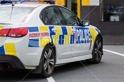 Side on photo of stationary Police car