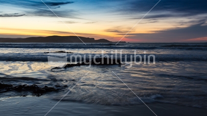 The coastal beauty of Curio Bay at sunrise in the Catlins (long exposure)