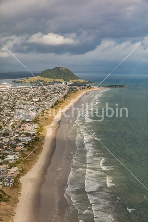A portrait view of the coastline up to Mount Maunganui