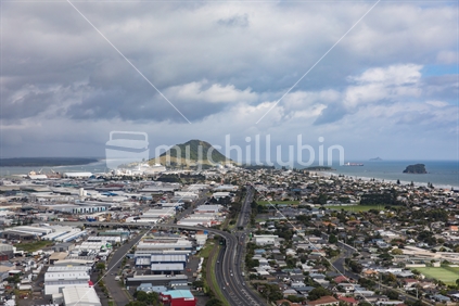 The commercial and urban view preceding the outlook of Mauao (Mt Maunganui)