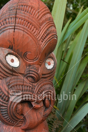 Wooden carving with paua insets in eyes, Hamilton Gardens