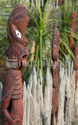 Row of maori carvings, Hamilton Gardens