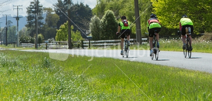 Cyclists enjoying a sunny day in the country