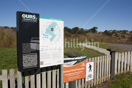 Signs near the Manawatu river walking and biking tracks, Palmerston North.