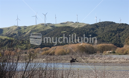 Manawatu River with wind turbines visible on the ranges.  