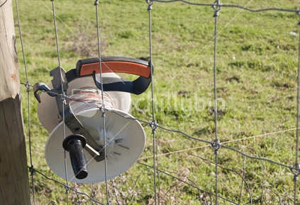 Electric fence spool.