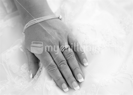 Closeup of brides hand and ring on wedding day