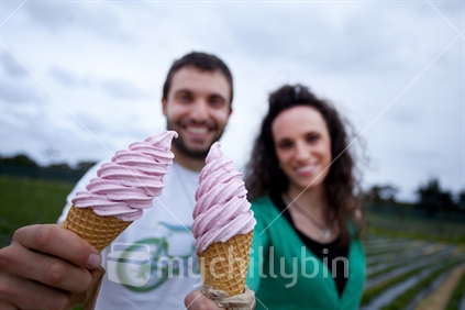They are holding ice creams!.