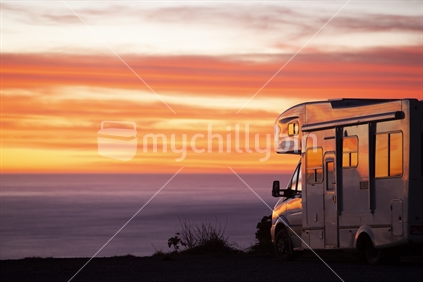 Campervan painted with the reflection of the sunrise