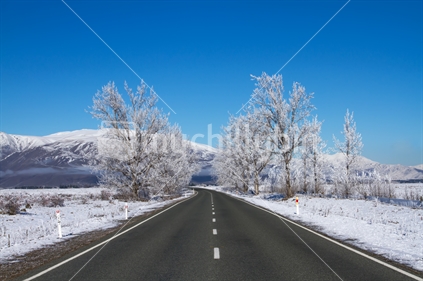 Asphalt road after snow storm in New Zealand.