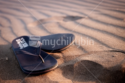 Jandals in the sand