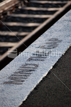 Railway tracks at a platform in Auckland.