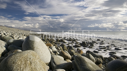 Boulders on the shore of a beach in Nelson