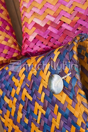 Flax weaving (raranga harakeke) - close up of a group of kete (bags)