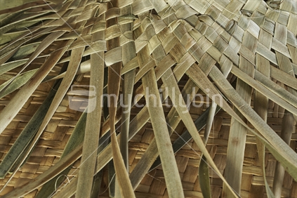 Closeup of an unfinished potae - Maori flax weaving in progress