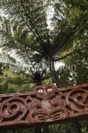 Detail of the carved entrance panel (paepae) at historic Koru Pa near Oakura, Taranaki