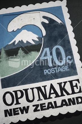 'Opunake New Zealand' surf wave mural in stamp form - Opunake, Taranaki