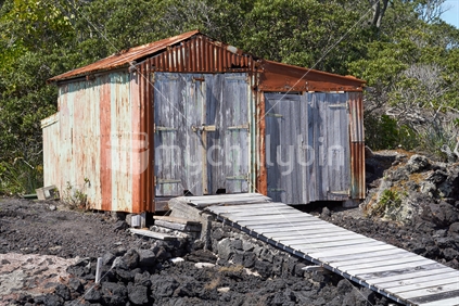 Old iconic boat shed on Rangitoto Island near Auckland