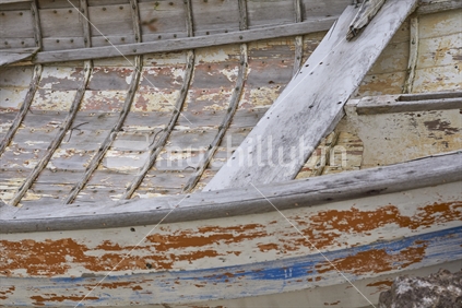 Closeup of an old weathered dinghy boat