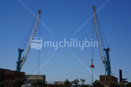 Two container cranes working at Port Timaru.