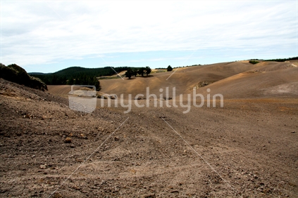 Newly cleared and worked clay country in Otago will look barren until the new crops appear.