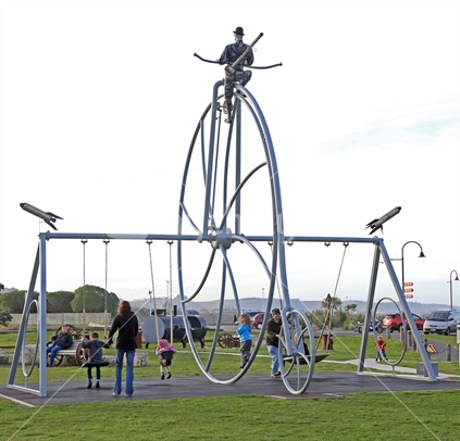 The huge penny farthing sculpture at the Oamaru playgound, seen from the rear.