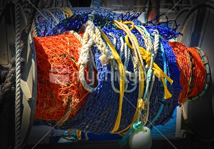 A large roll of fishing net and rope.