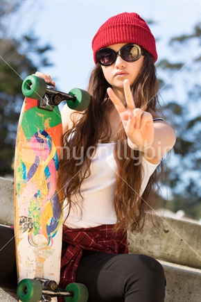 Teenage Maori skater girl.