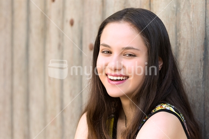 Pretty young maori woman laughing