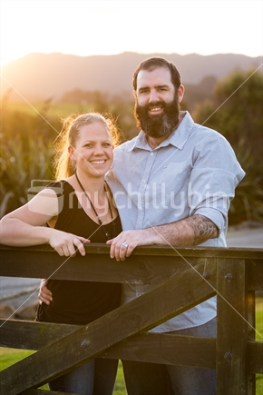 Happy smiling romantic couple at sunset
