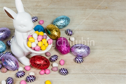 Bunny holding easter eggs