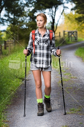 Beautiful young woman hiking