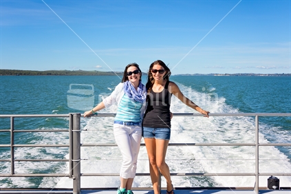 Two women friends on ferry boat
