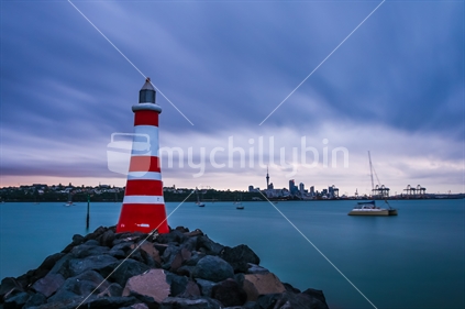View of Orakei Marine Lighthouse and Auckland CBD from Tamaki Drive | Auckland, NEW ZEALAND