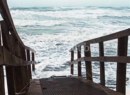Ocean's rising! This is the access ramp to Waihi Beach with a 120kph gale blowing and a king tide. 