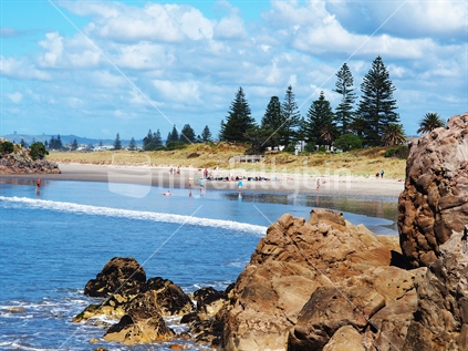 The east end of Mount Maunganui beach with a rocky foreground
