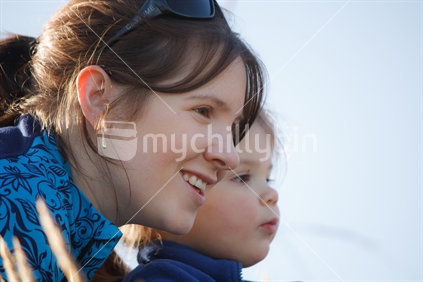 Happy Mum and daughter at the beach.